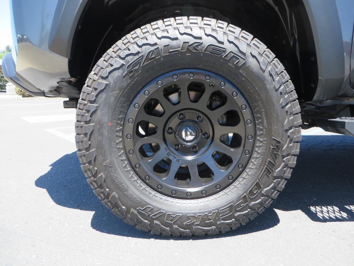 2017 CHARCOAL /GREY Toyota Tacoma TRD OFF-ROAD Double Cab Long Bed V6 6AT 4WD (3TMDZ5BN3HM) with an 3.5L V6 engine, automatic transmission, located at 2630 Grass Valley Highway, Auburn, CA, 95603, (530) 508-5100, 38.937893, -121.095482 - TRD Off-road Tacoma with a level kit, 17" Fuel Vector wheels, Falken Wildpeak AT tires, N-Fab running boards, Roll Up tonneau cover, BedRug, and window Deflectors. - Photo#8